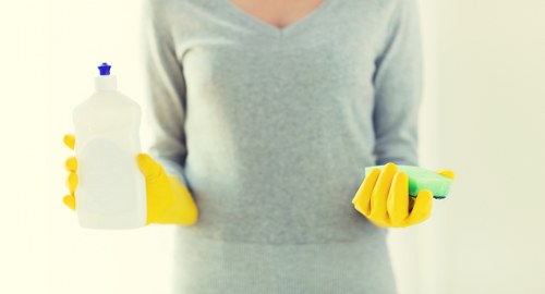 Technician treating a carpet stain in a Richmond home