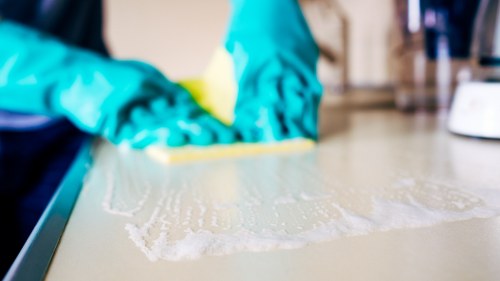 Detailed post-construction cleaning of kitchen surfaces in Richmonduponthames